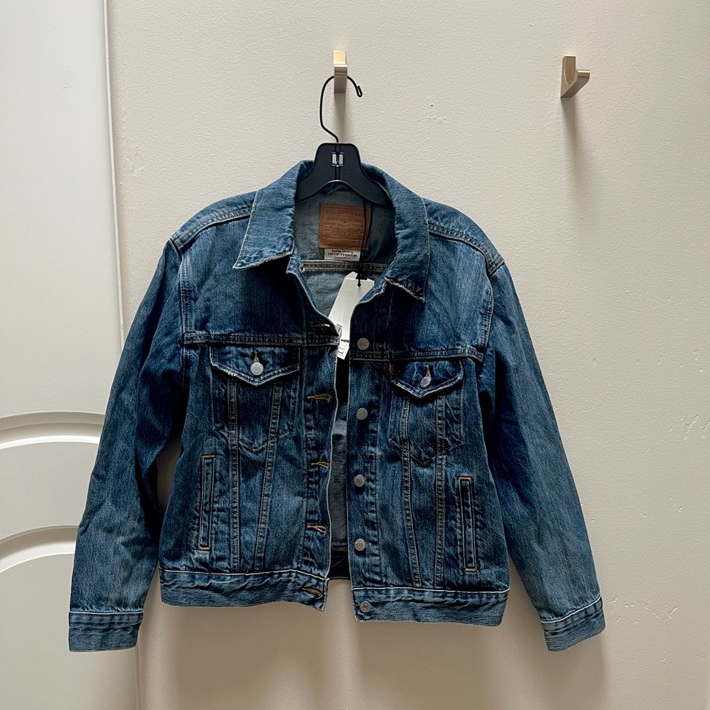 Never worn Levi’s Jean Jacket! New w/ Tags